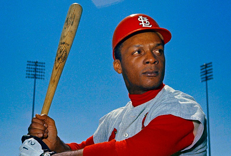 This 1968 file photo shows St. Louis Cardinals outfielder Curt Flood. Flood set off the free-agent revolution 50 years ago Tuesday, Dec. 24, 2019, with a 128-word  letter to baseball Commissioner Bowie Kuhn, two paragraphs that pretty much ended the career of a World Series champion regarded as among the sport's stars but united a union behind his cause. (AP Photo/File)