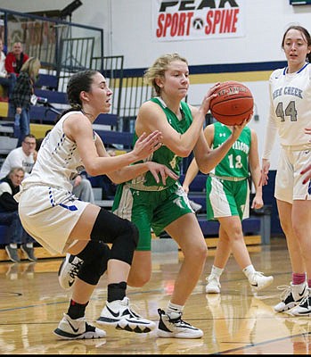 Natalie Heckman of Blair Oaks handles the ball Sunday against Deer Creek in the third-place game of the Jefferson Bank Holiday Hoops Classic at Rackers Fieldhouse.