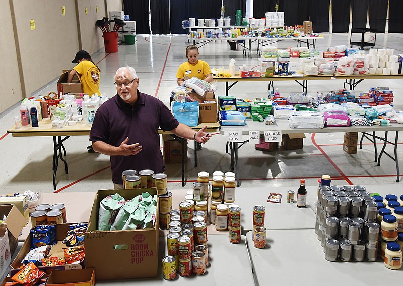 In this July 12, 2019 News Tribune file photo, Ken Harland, administrative minister for Capital West Christian Church, talks about the distribution system at Capital West Event Center. The church agreed to temporarily house the items people needed in the immediate aftermath of the May 22, 2019, tornado and spring flooding.