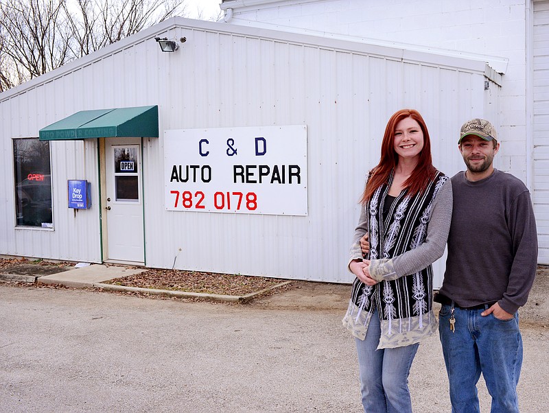 <p>Sally Ince/For the Democrat</p><p>Chris and Devin Wilkerson stand together Thursday outside C&D Auto Repair in Russellville.</p>