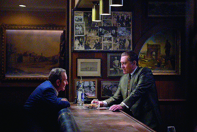 This image released by Netflix shows Joe Pesci, left, and Robert De Niro in a scene from "The Irishman."