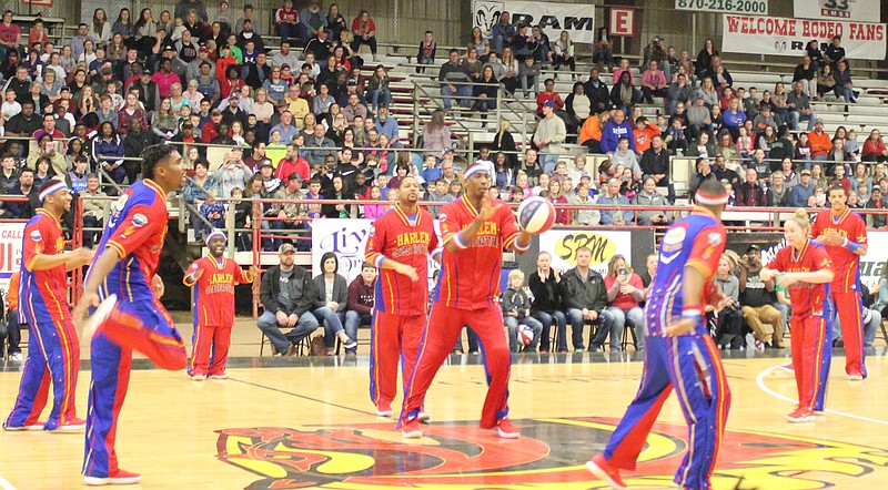 The Harlem Globetrotters participate in the Magic Circle as part of their pregame warmup on Feb. 8, 2018, at the Four States Fairgrounds Arena.