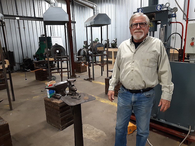 Don McIntosh, coordinator of Bill Moran School of Bladesmithing, shows off the gear on which his students learn the craft at the campus of Texarkana College.