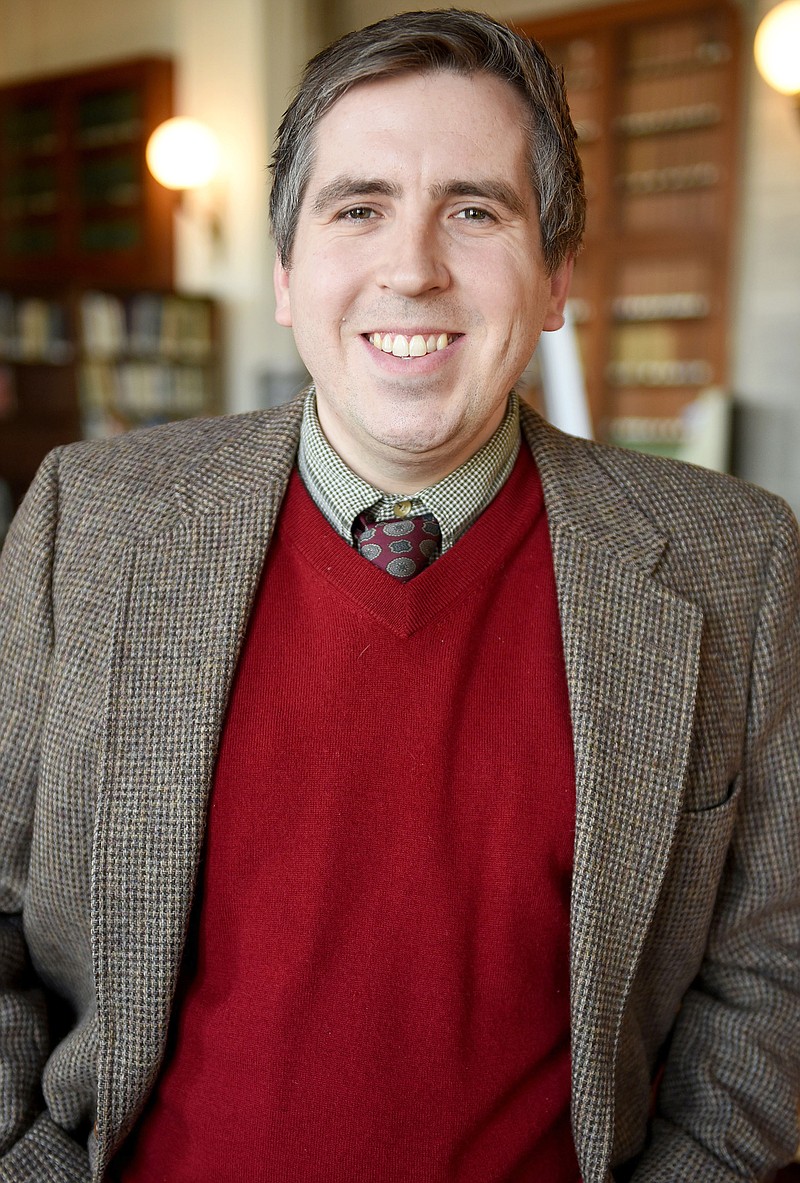 Nathan Elwood poses for a portrait Dec. 18 in the Missouri state Capitol Legislative Library in Jefferson City. Elwood is a legislative librarian.