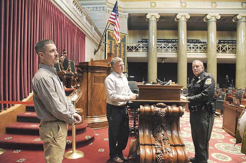 Lt. Brian Quick of Capitol Police, right, Randy Werner, Missouri House of Representatives Sargeant at Arms, middle, and Greg Sandbothe, director of operations for Missouri House, discuss security measures in place and testing that has already occurred leading up to Wednesday's opening day of the Legislature. Security is an important factor in the smooth running of day-to-day operations at the statehouse and keeping the visiting public and legislators safe takes top priority.