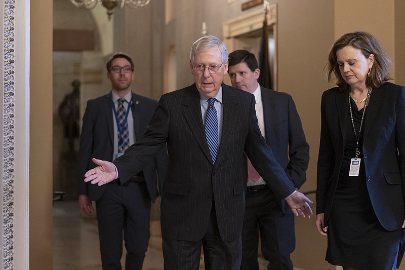 Senate Majority Leader Mitch McConnell, R-Ky., arrives for a closed meeting with fellow Republicans as he strategizes about the looming impeachment trial of President Donald Trump, at the Capitol in Washington, Tuesday, Jan. 7, 2020. (AP Photo/J. Scott Applewhite)