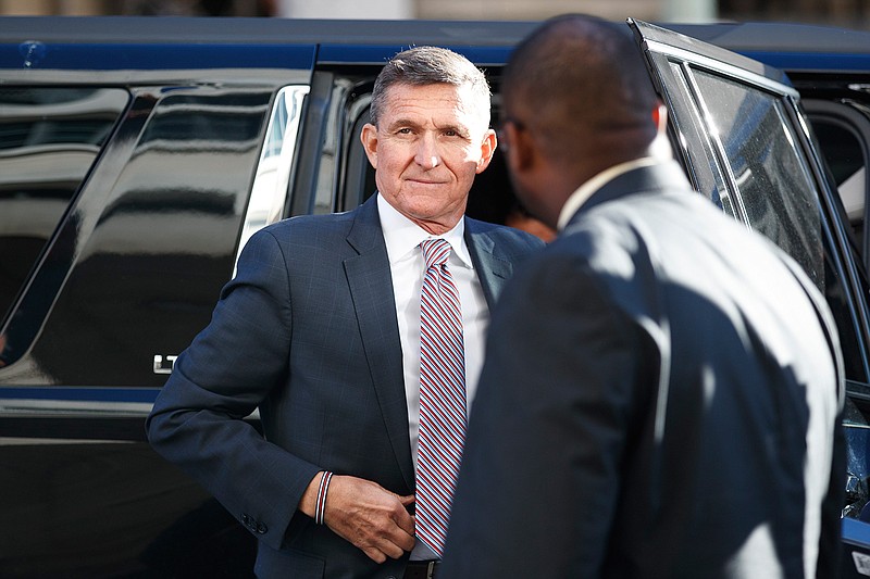  In this Dec. 18, 2018, file photo, President Donald Trump's former national security adviser Michael Flynn arrives at federal court in Washington. In reversal, US prosecutors no longer oppose prison time for former Trump national security adviser Michael Flynn. (AP Photo/Carolyn Kaster, File)