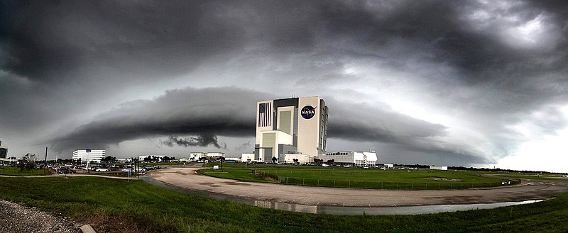 In this panoramic view, thunderstorms flank the Vehicle Assembly Building at Kennedy Space Center, Fla., on August 6, 2019. (Joe Burbank/Orlando Sentinel/TNS)