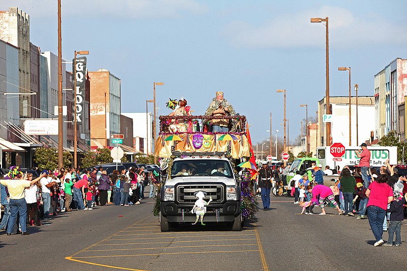 A parade from a past Mardi Gras celebration rolls through downtown Texarkana. (Staff file photo by Curt Youngblood)

