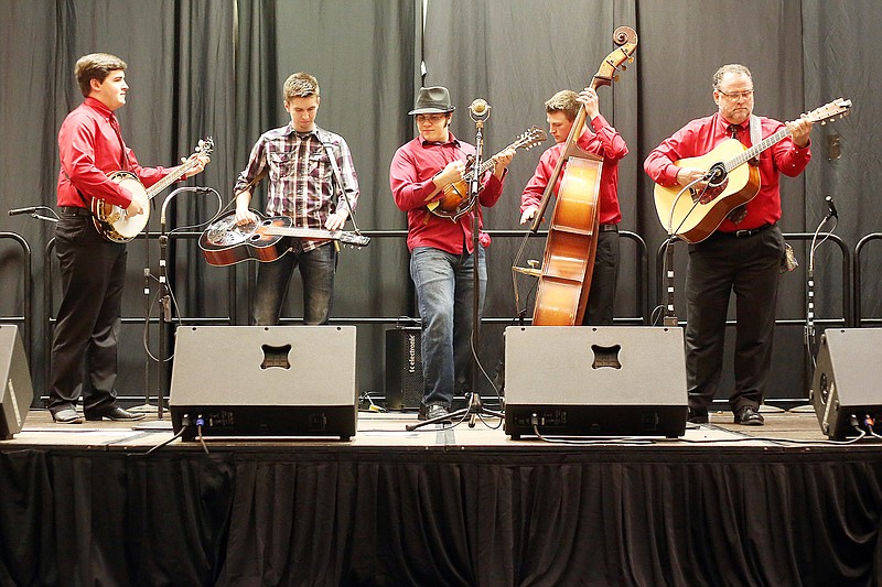 <p>Shelby Kardell/News Tribune</p><p>Bull Harman and Bull’s Eye plays at the Capital Plaza Hotel and Convention Center during the 43rd annual Bluegrass Music Awards and 34th Mid-West Convention in Jefferson City on Jan. 14, 2017. This year’s awards and convention will be held this weekend.</p>