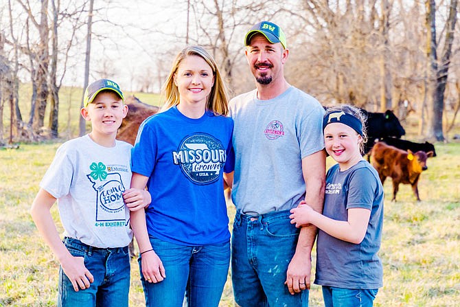 Kristin Benne and husband Brad, center, co-owners of an Angus cattle operation near Kingdom City, were among the first to donate to Mo Beef for MO Kids at North Callaway R-1. Benne said she noticed her children Morgan and Reed rarely had beef as a school lunch option.