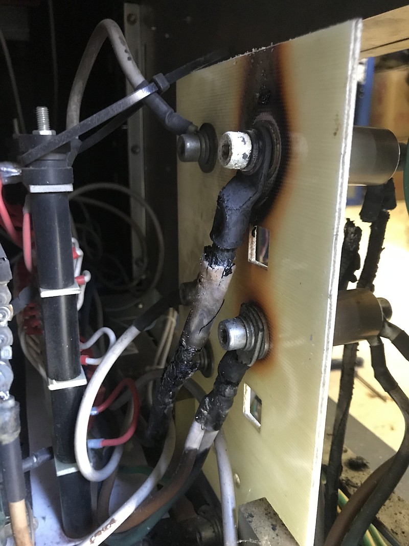 The damage from a recent fire is seen on a component from the main KTXK transmitter. The safety features confined the damage to the immediate area, shielding the rest of the transmitter. It is unknown at this time when the transmitter will be back to full power. (Submitted photo)
