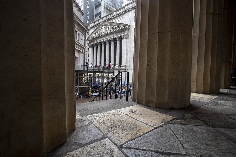 FILE - In this Jan. 3, 2020, file photo the New York Stock Exchange is framed by the columns at Federal Hall National Memorial in New York. The U.S. stock market opens at 9:30 a.m. EST on Friday, Jan. 10. (AP Photo/Mary Altaffer, File)