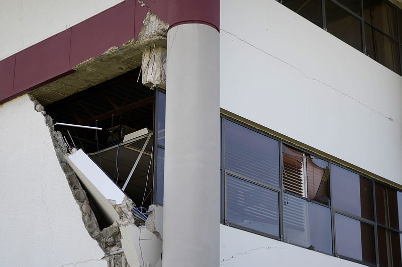 A municipal building is damaged after a magnitude 5.9 earthquake in Guanica, Puerto Rico, Saturday, Jan. 11, 2020. The morning quake caused further damage along the island’s southern coast, where previous recent quakes have toppled homes and schools. (AP Photo/Carlos Giusti)