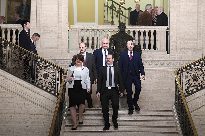 Arlene Foster of the DUP leads her party into the chamber at Parliament Buildings, Stormont, Belfast, Northern Ireland, Saturday Jan. 11, 2020. Legislators returned to Northern Ireland’s assembly Saturday for the first time in three years, after a deal was struck to restore the divided region’s mothballed power-sharing government. (Michael Cooper/PA via AP)