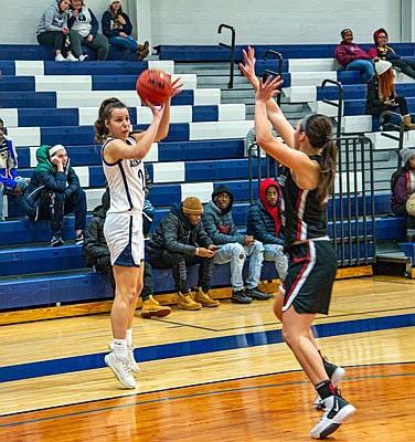 Natasha Elliott of Lincoln hoists a 3-pointer during Saturday's game against Central Missouri at Jason Gym.