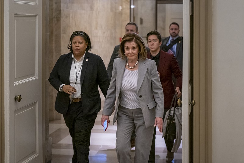 Speaker of the House Nancy Pelosi, D-Calif., arrives at the Capitol in Washington, Friday, Jan. 10, 2020. Pelosi hasn't relayed the articles of impeachment to the Senate for trial three weeks since President Donald Trump was impeached on charges of abuse and obstruction. Last night, she led the Democrat-controlled House in passing a measure limiting Trump's ability to take military action against Iran after he ordered the U.S. killing of a top Iranian general. (AP Photo/J. Scott Applewhite)