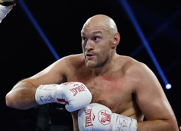 In this June 15, 2019, file photo, Tyson Fury boxes against Tom Schwarz in Las Vegas.