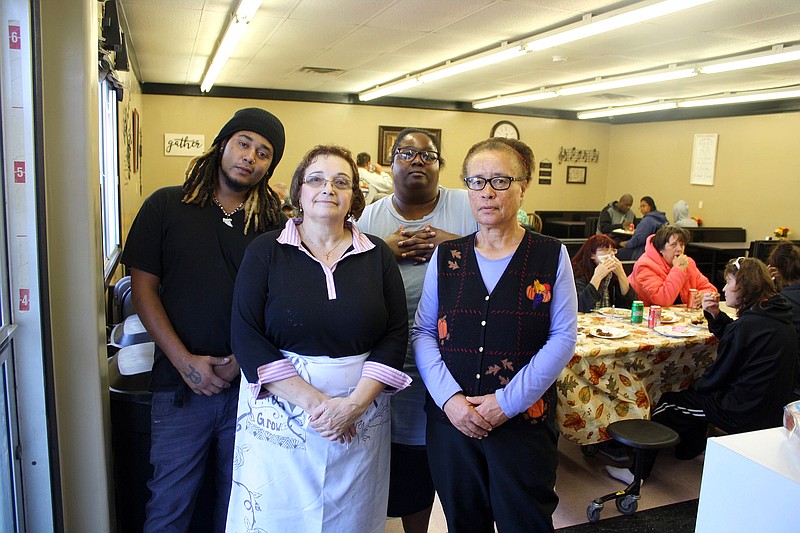 FILE: Cavender Johnson, left, Gerry Mize, LaShawn Lee and Jackie Butler volunteered during the 2019 Thanksgiving dinner at the Fulton Soup Kitchen. In 2020, the FSP will be serving dinners five days a week but not lunch.