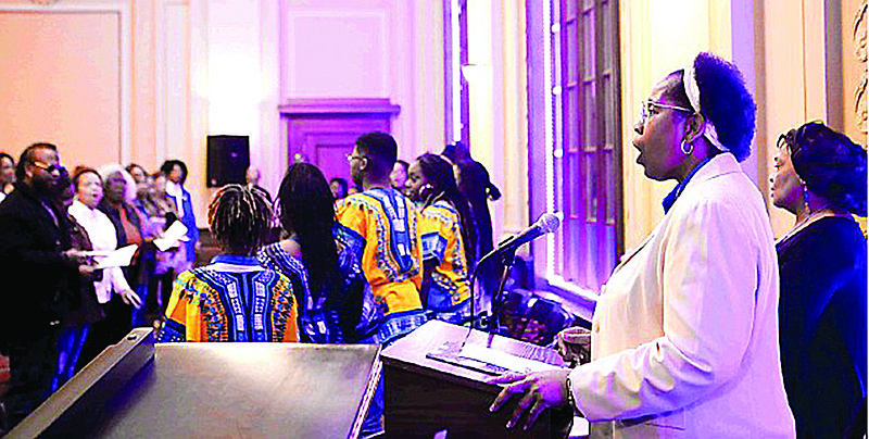 Barbara Larry leads the crowd with the song "Lift Every Voice" at last year's 18th annual African American Voice at the Texarkana Regional Arts Center in Texarkana, Texas.