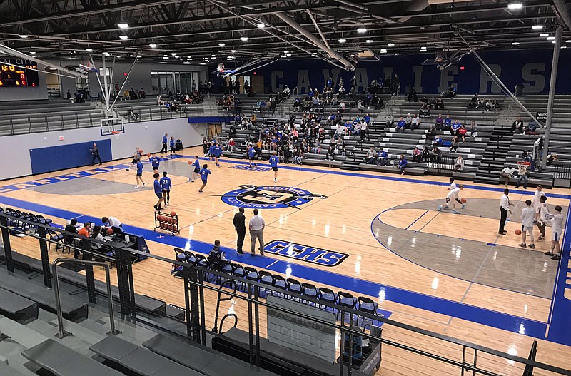 Players warm up Tuesday, Jan. 14, 2019, in advance of the high school basketball game between the Capital City Cavaliers and Boonville Pirates in Jefferson City.