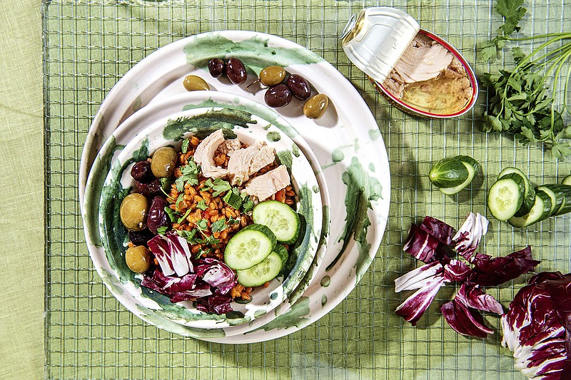 Well-seasoned farro with your favorite proteins and vegetables makes for a delicious grain bowl. (Mariah Tauger/Los Angeles Times/TNS) 