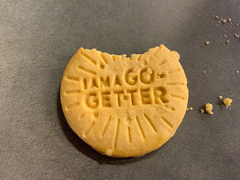 One of the new Lemon-Ups flavor Girl Scout Cookies (with one bite removed). (David J. Neal/Miami Herald/TNS) 