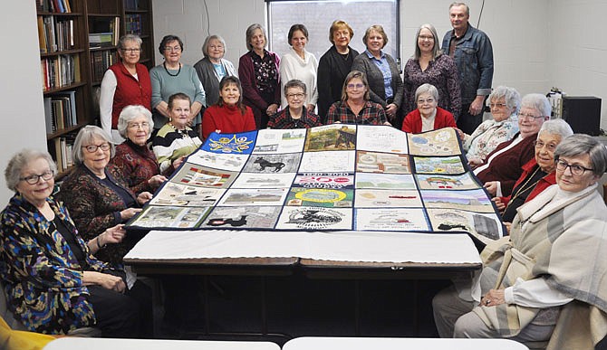 Kingdom of Callaway Historical Society recruited dozens of local quilters to celebrate Callaway County's 200th anniversary. Those pictured include: in the front row, from left, Esther Digh, Judy Schaneman, Joyce Williams, Nancy Hinnah, Rhea Horstman, Jayne Wills, Terry Pope, Mary Jane Schultz, Marge Lubbers, Brenda Rentschler, Sue Anderson and Bonnie Shiverdecker. In the back row, from left, are Ruth Burt, Brenda Rose, Kay Hord, Mary Osburn, Jill Fansler, Sandy Edwards, Carol Torkey, and Teresa and Mike Cuno (from Rooster Creek Quilting). Not pictured are Carol Leible, Helen Weber, Rita Lamb and Terry Keck.