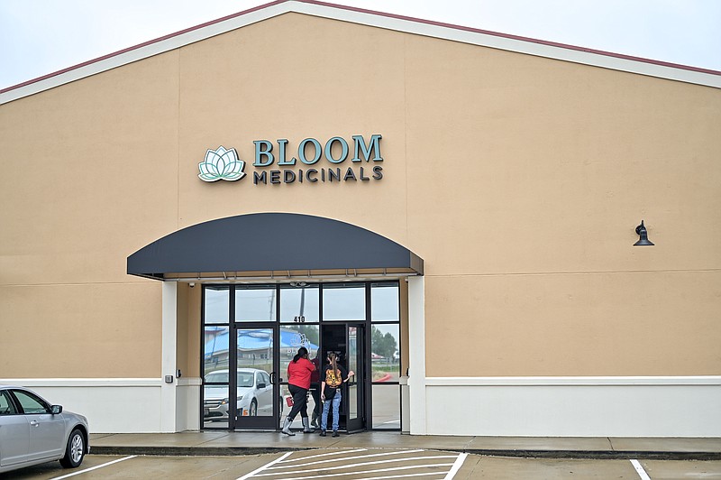 Customers walk into the Bloom Medicinals facility  on Wednesday, Jan. 15, 2020, at 410 Realtor Ave. in Texarkana, Arkansas, for the grand opening of the medical marijuana dispensary.