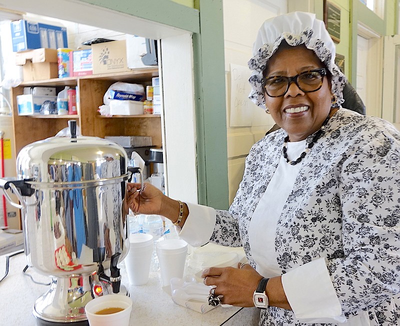 Genell Jackson of Naples, Texas, is dressed in her performance costume as a member of the Pleasant Hill Quilters who will present their program "Secret Quilters — Secret Code Quilts of the Underground Railroad" on Thursday in Pleasant Hill.