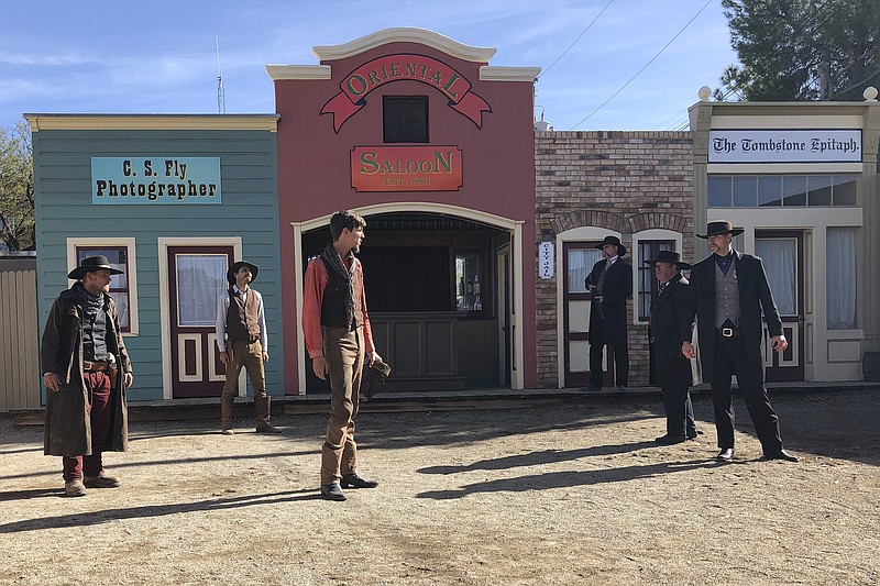 Actors are seen reenacting the events that led to an 1881 shootout in the town that left three dead and became one of the most famous gun battles in the Old West on Saturday, Nov. 20, 2019 in Tombstone, Ariz. Numerous books and movies have been based on the shootout. Tombstone was founded and flourished in the late 19th century after large amounts of silver were found in the area. (AP Photo/Peter Prengaman)