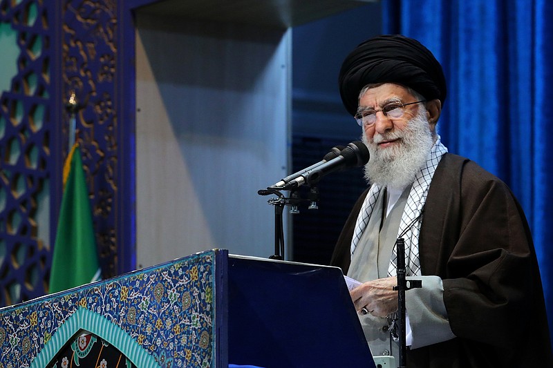 In this photo released by an official website of the office of the Iranian supreme leader, Supreme Leader Ayatollah Ali Khamenei delivers his sermon in the Friday prayers at Imam Khomeini Grand Mosque in Tehran, Iran, Friday, Jan. 17, 2020. Iran's supreme leader said President Donald Trump is a "clown" who only pretends to support the Iranian people but will "push a poisonous dagger" into their backs, as he struck a defiant tone in his first Friday sermon in Tehran in eight years. (Office of the Iranian Supreme Leader via AP)