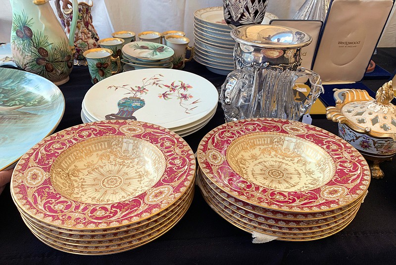 This Sept. 7, 2019 photo provided by Tracee Herbaugh shows some of the china for sale at a flea market in Brimfield, Mass. China has become a staple at flea markets, as younger people opt to sell or donate heirloom dishware. (Tracee Herbaugh via AP)