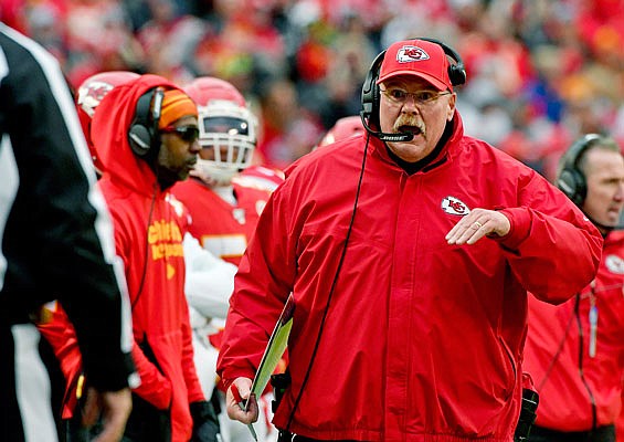 Chiefs coach Andy Reid talks to an official during the regular-season finale against the Chargers at Arrowhead Stadium.