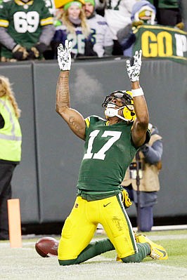 Packers wide receiver Davante Adams celebrates his touchdown catch during last Sunday's win against the Seahawks in Green Bay, Wis.