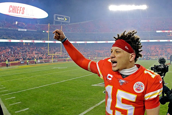 Chiefs quarterback Patrick Mahomes celebrates after last Sunday's win against the Texans at Arrowhead Stadium. Mahomes and the Chiefs will host the Titans this afternoon in the AFC Championship Game.