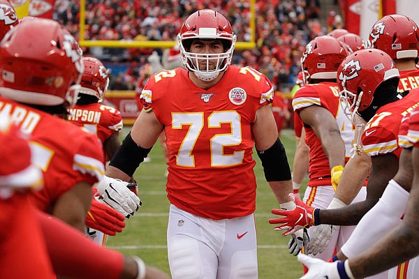 Chiefs offensive tackle Eric Fisher runs onto the field before last month's game against the Chargers at Arrowhead Stadium in Kansas City.