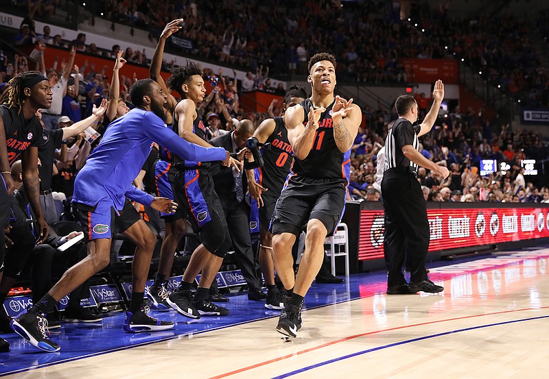 Florida forward Keyontae Johnson (11) celebrates after making a 3-point shot against Auburn during the second half of an NCAA college basketball game Saturday, Jan. 18, 2020, in Gainesville, Fla. (AP Photo/Matt Stamey)