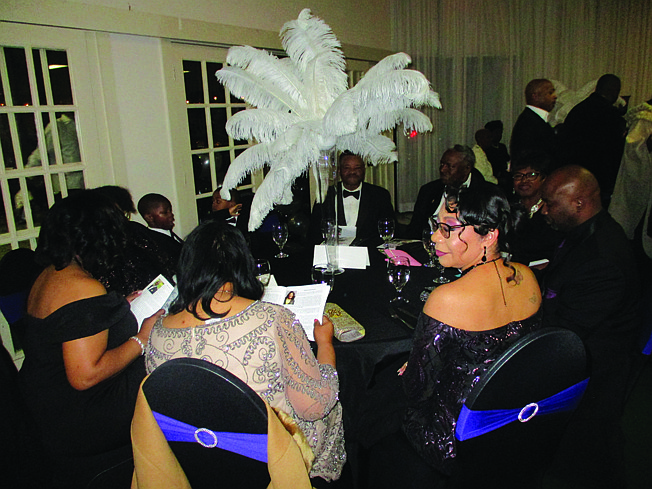 Attendees socialize over dinner Sunday evening during the 18th annual Acts of Kindness Presentation Gala at the Twin City Events and Conference Center. Local residents and associations were honored for leadership, innovation, inspiration and public service as advocated by Dr. Martin Luther King Jr. For full coverage, see Tuesday's Gazette in print or online.