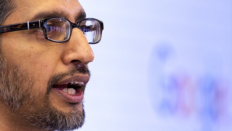 Google's chief executive Sundar Pichai addresses the audience during an event on artificial intelligence at the Square in Brussels, Monday, Jan. 20, 2020. Google's chief executive called Monday for a balanced approach to regulating artificial intelligence, telling a European audience that the technology brings benefits but also negative consequences. (AP Photo/Virginia Mayo)