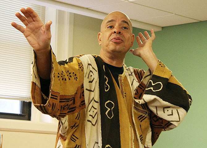 Storyteller Antonio Rocha performs Monday afternoon for children at Callaway County Public Library.