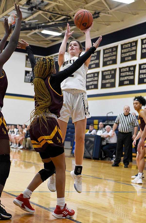 Helias guard Lindsey Byers shoots the ball during Monday afternoon's game against Lutheran North at Rackers Fieldhouse.