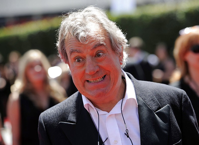 In this Saturday, Aug. 21, 2010 file photo, Terry Jones arrives at the Creative Arts Emmy Awards in Los Angeles. Jones, a member of the Monty Python comedy troupe, has died at 77. Jones's agent says he died Tuesday Jan. 21, 2020. (AP Photo/Chris Pizzello, file)