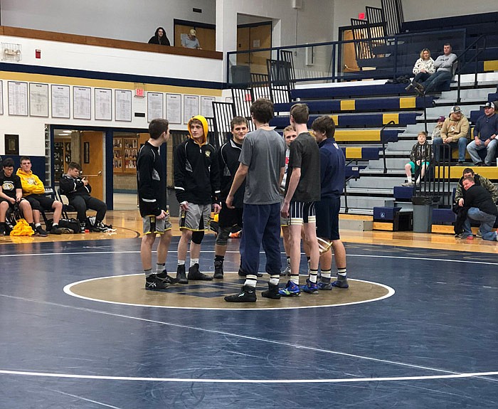 Helias gets ready to take on Sedalia Smith Cotton in a wrestling dual Tuesday, Jan. 21, 2020, in Jefferson City.