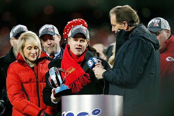 Norma Hunt kisses Lamar Hunt Trophy after Chiefs reach Super Bowl