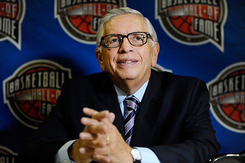In this Aug. 7, 2014, file photo, David Stern, a member of the 2014 class of inductees into the Basketball Hall of Fame, listens to a question during a news conference in Springfield, Mass. A tribute to late NBA Commissioner Stern is to be held at New York's Radio City on Tuesday, Jan. 21, 2020. (AP Photo/Jessica Hill, File)