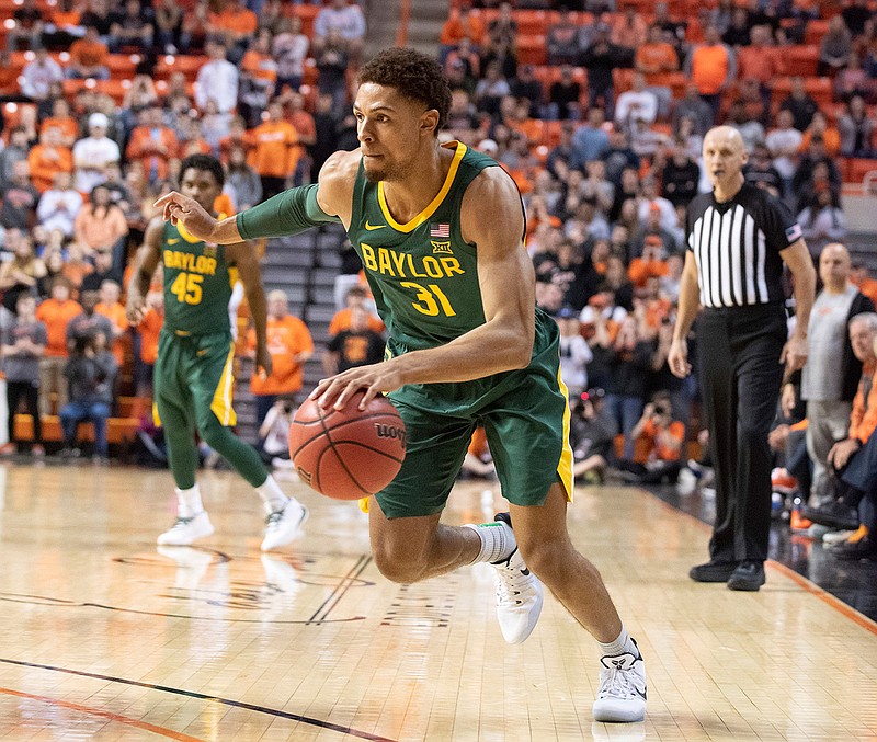 Baylor guard MaCio Teague (31) drives the ball during the second half of an NCAA college basketball game against Oklahoma State in Stillwater, Okla., Saturday, Jan. 18, 2020. (AP Photo/Brody Schmidt)