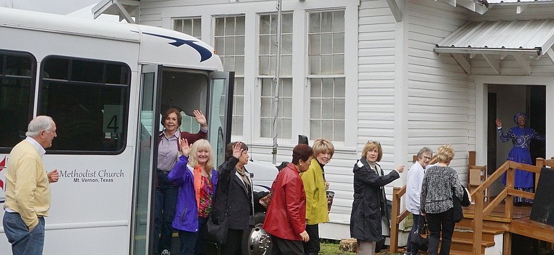 Members of the Mount Vernon Shakespeare Club arrive Jan. 16 at Pleasant Hill Rosenwald School, home of the Pleasant Hill Quilters. The guests are being greeted at the door by quilting leader Flo Stevenson in the doorway. 