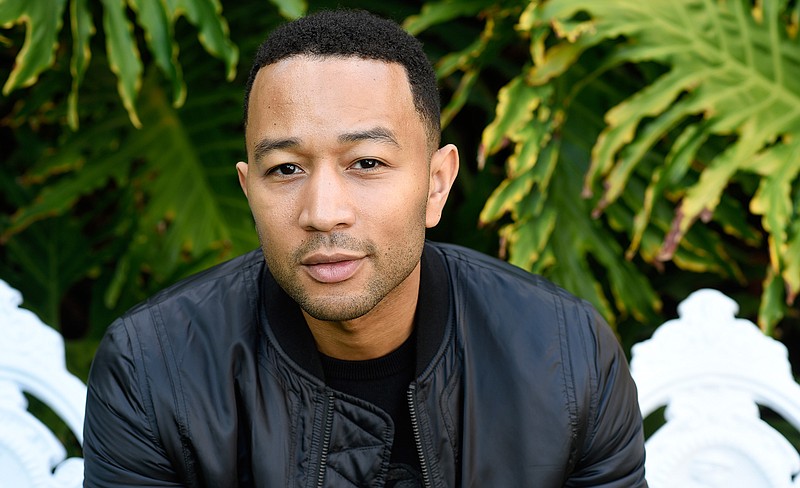 This Nov. 21, 2016 file photo shows singer-songwriter John Legend during a portrait session in West Hollywood, Calif. Legend is nominated for a Grammy for best traditional pop vocal album with his holiday album, "A Legendary Christmas."(Photo by Chris Pizzello/Invision/AP, File)