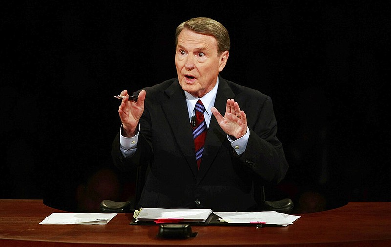 This Sept. 26, 2008, file photo shows debate moderator Jim Lehrer during the first U.S. Presidential Debate between presidential nominees Sen. John McCain, R-Ariz., and Sen. Barack Obama, D-Ill., at the University of Mississippi in Oxford, Miss. PBS announced that PBS NewsHour's Jim Lehrer died Thursday, Jan. 23, 2020, at home. He was 85.